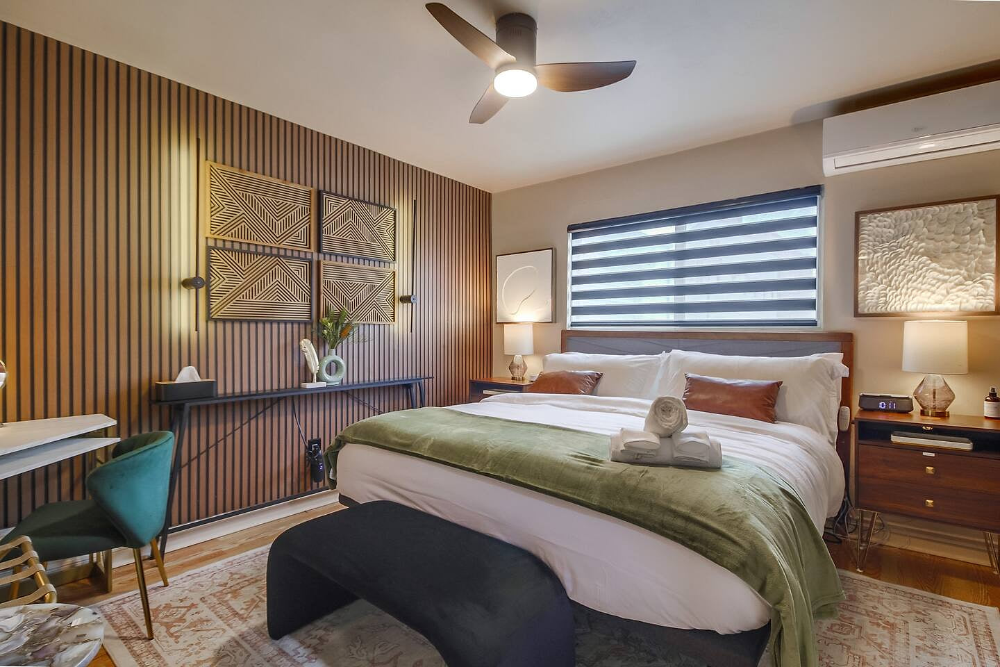 Bedroom Bliss: Modern retreat with plush bedding, stylish decor, and lovely natural light!