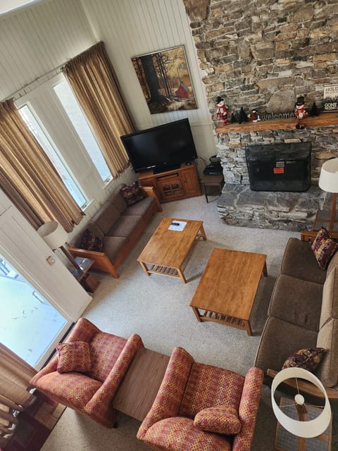 Lower level with large flat screen tv, dvd player and plenty of seating
