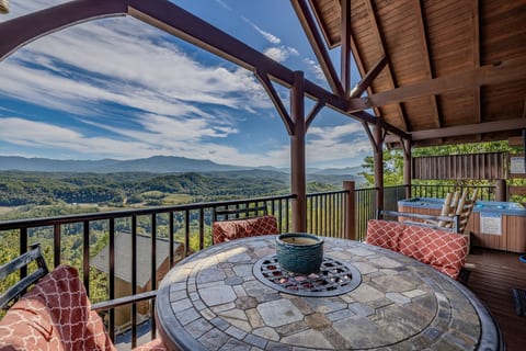 The upper level has a soothing hot tub