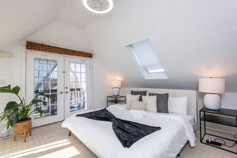 Bedroom 3 - King size bed. Has a separate balcony. Skylight and double doors bring natural light.