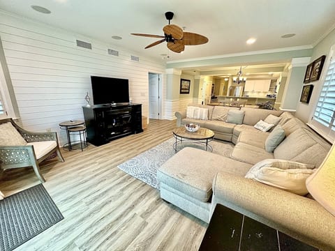 Living Room with ample comfort seating and flat-screen television #301 Dunescape, Isle of Palms, SC | IOP Escapes