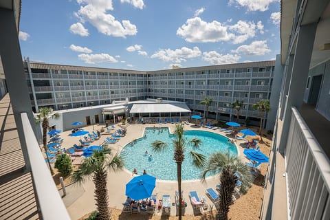 Large outdoor pool at bldg 1 with seasonal poolside restaurant The Beach Bear. Heated outdoor pool starting March 1st.