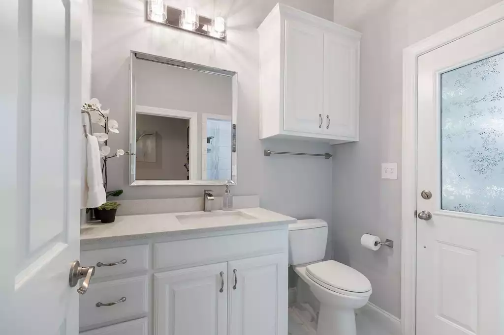 Bathroom #3 is on the main floor with shower and outdoor access. Bathroom #3 is on the main floor with shower and outdoor access. - Main House at Whispering Oaks Estate - Dripping Springs
