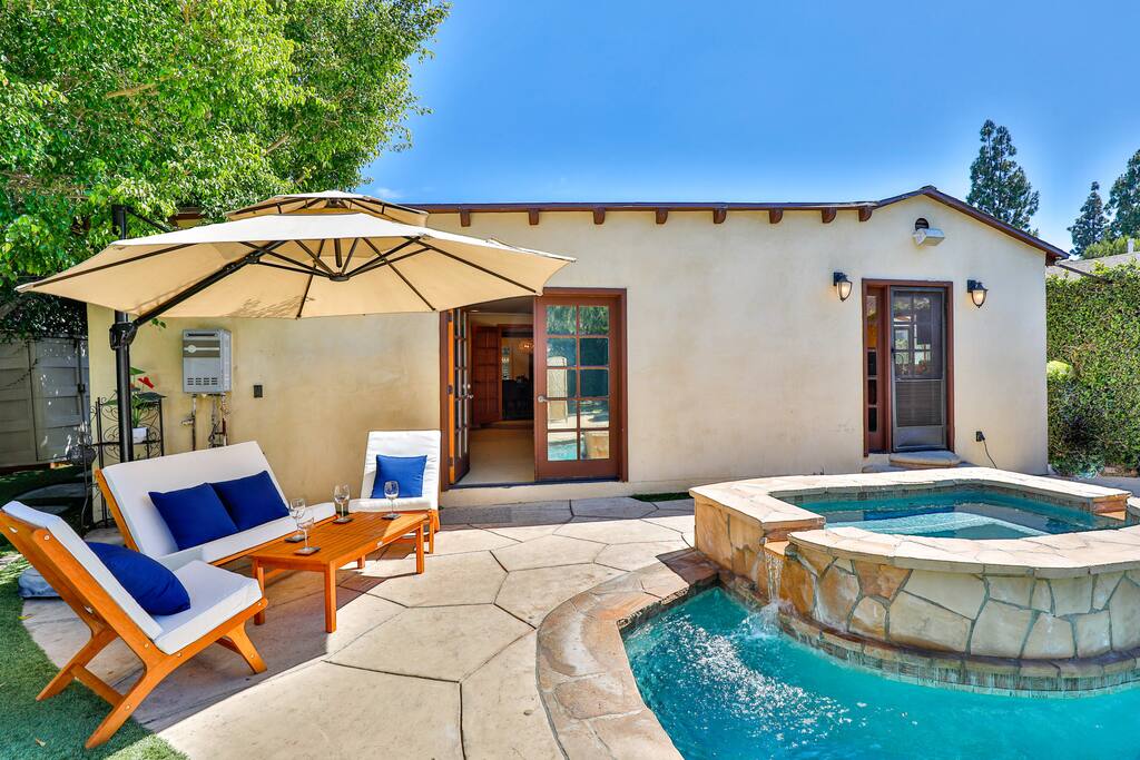 Expansive outdoor terrace with inviting seating spaces, ideal for social gatherings with friends.