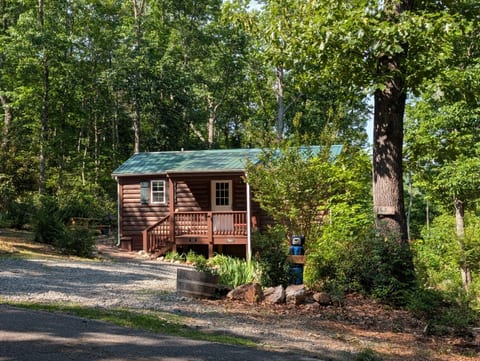 View from the main lane, cabin is located on a gravel driveway off of a paved main private driveway/lane
