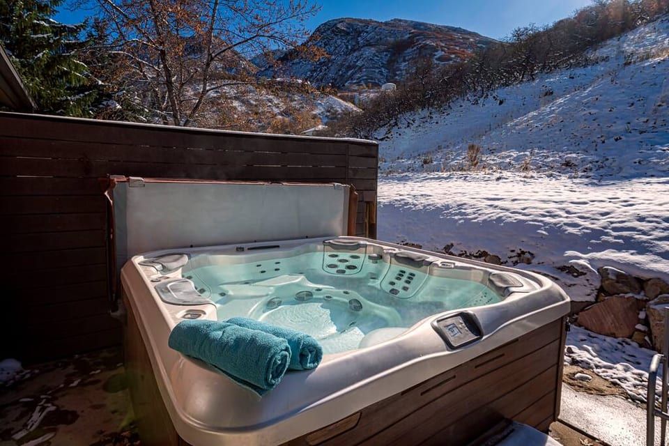 Wonderful views from the hot tub and back yard space. Hot tub is professionally serviced year round.