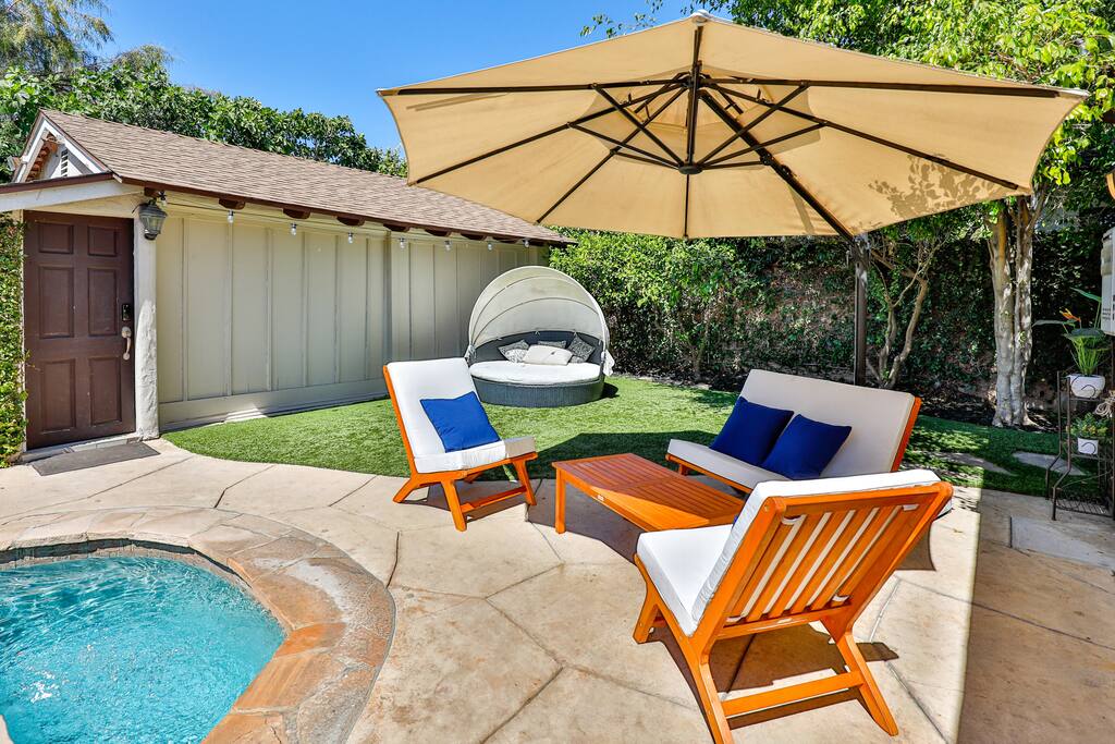 An heated pool, combined with an outdoor seating space, sets the stage for both entertainment and relaxation.