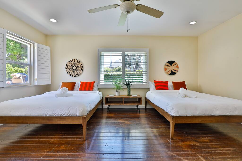 Generous and inviting room featuring two single beds for your comfort.