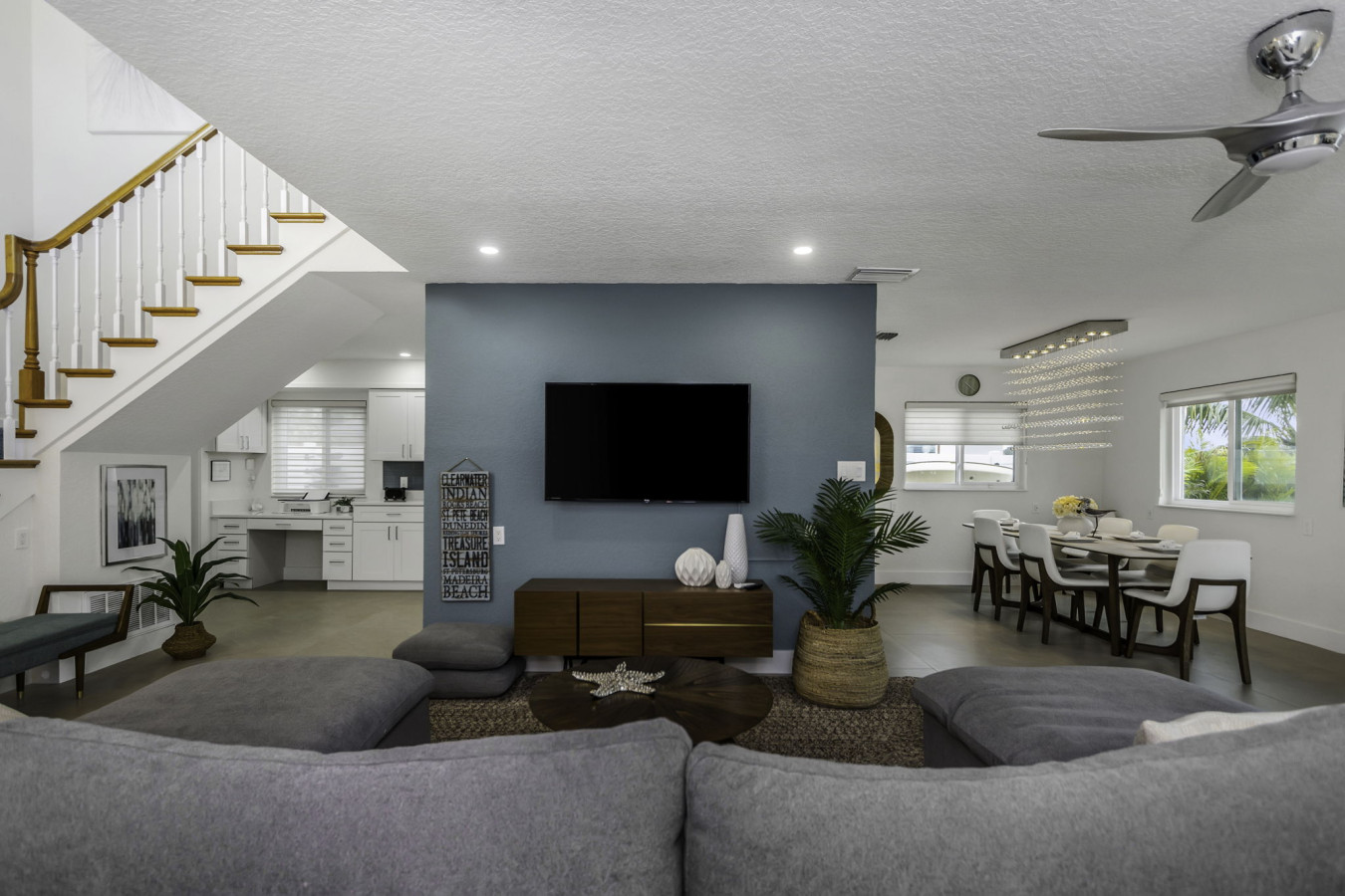 Open Floor Plan - Living Room/Entertainment Area - Workspace on left - Dining on right