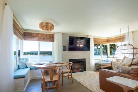 Watch your favorite shows and stream videos on the 65 inch smart TV in the bedroom, while sitting back and relaxing on the top grain leather sofa.