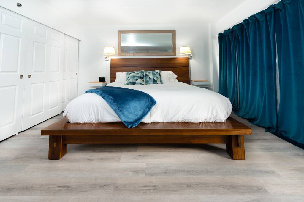 Comfortable king size bed with memory foam mattress! We use quality linens to make your sleep as enjoyable as possible. Black out curtains to help you sleep in!