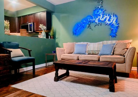 Cozy living room with comfortable seating and the GLO Getaway glow.