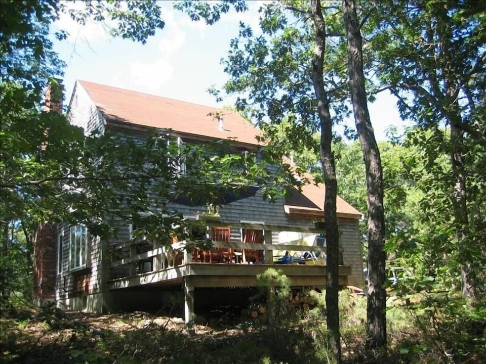 Back of house, private deck & wooded property