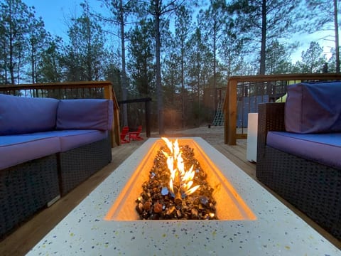 Cozy up by the by the fire with your favorite beverage and enjoy evening air.