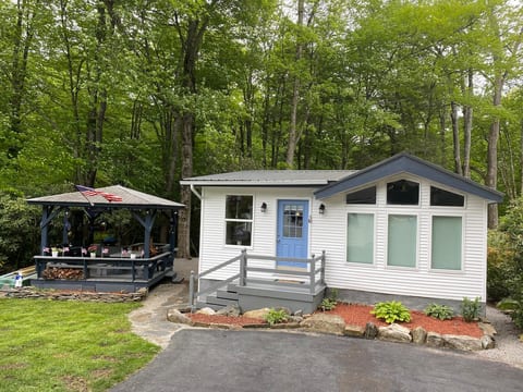 Front of house, gazebo and parking for 2 cars