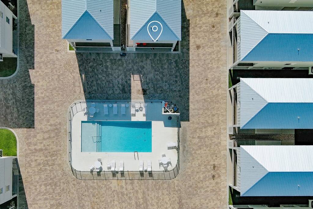 Heated Pool with chairs and loungers