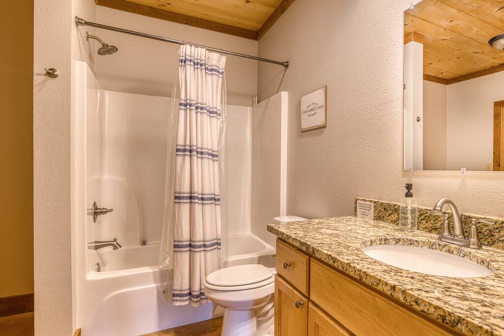 Terrace level bathroom has two doors. One for en-suite king attached and the second to the gaming living room. Full bathroom with complimentary soaps and soft towels 