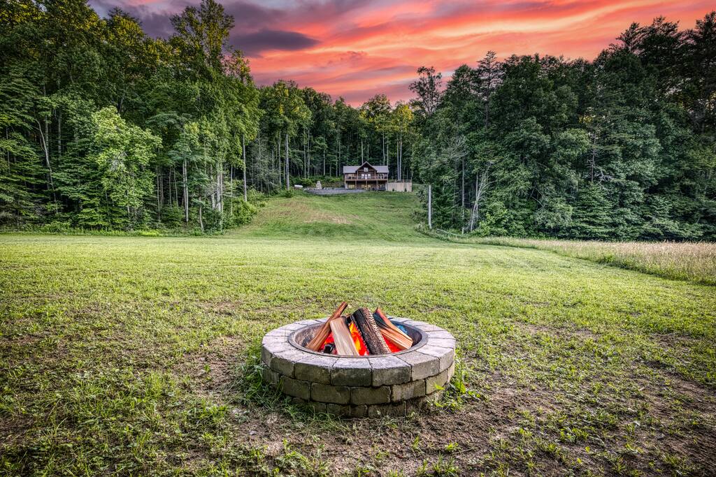 Down by the water’s edge where the grass ends is another firepit!! Plenty of space for kids and dogs to run and play as well. 3 acres of wide open space to get away and relax 