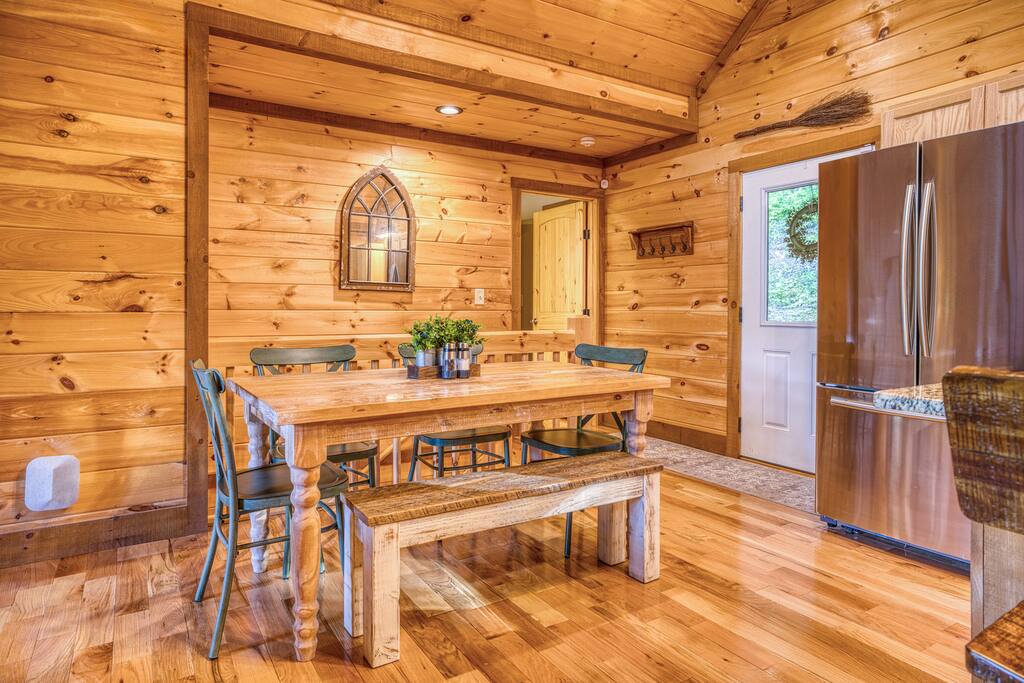 Open living space allows for great conversation. And this floor plan is perfect for families and friends.  Dining table has seating for everyone and is part of the main level kitchen and living room 