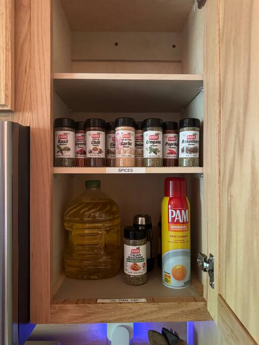 Going on vacation and staying in to cook with seasonings and cooking spray for a great meal inside or outside. Table in porch includes gas grill 