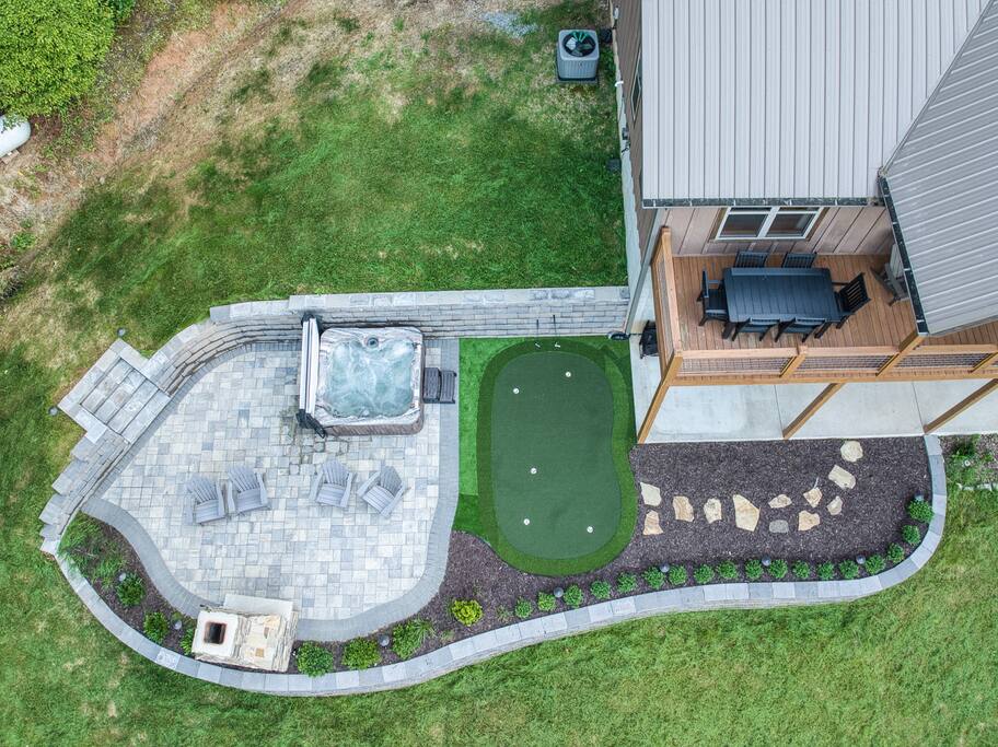 A view from above! Just completed in May 2025 this huge 500 sq ft patio space is directly off the terrace level. 