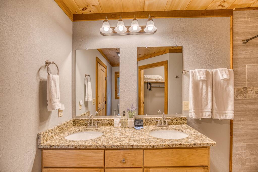 Double sinks! We love a bathroom that is en-suite and has space for all toiletries. Soaps included with towels and linens. 
