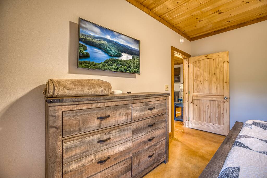 Every room has high quality finishes and beautiful furniture. Terrace level bedroom dresser has smart TV above for all your favorite shows 