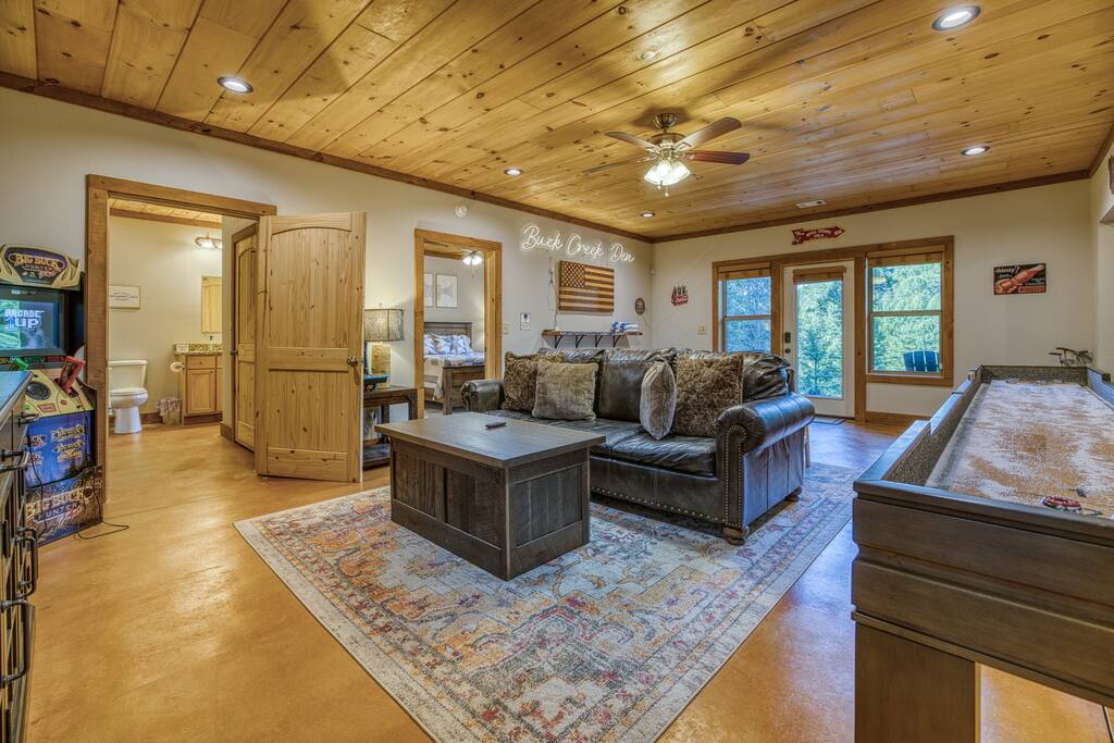 Terrace level is where the games and fun continue! Large soft leather seating with flat screen television, video games, and more there is plenty of room for everyone to have fun. Easy walk out to the outdoor patio area and hot tub 