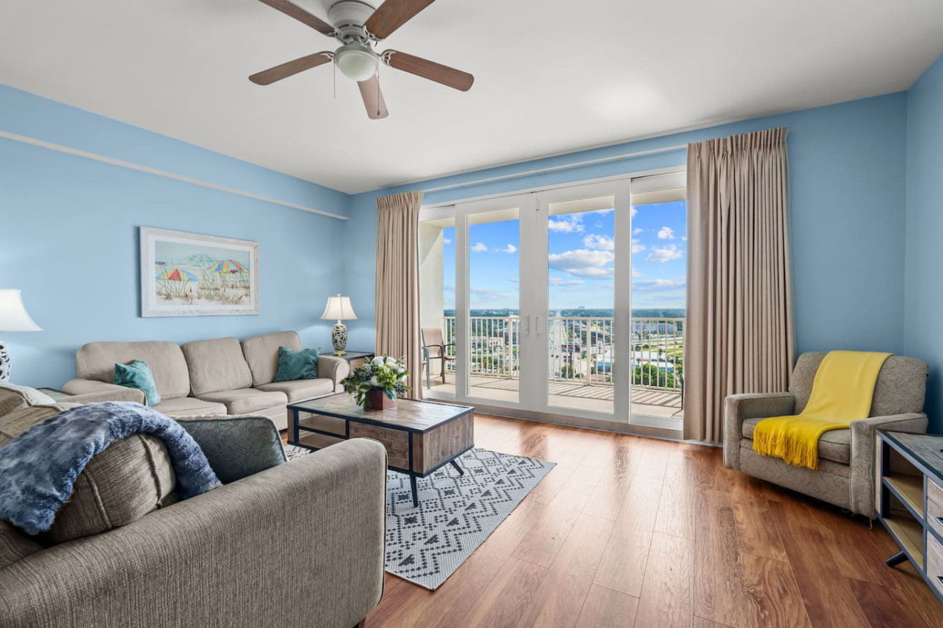Bright Living Room – Comfortable seating with direct access to the balcony and stunning views.