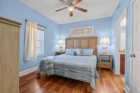 Master Bedroom with King Bed – Spacious master suite featuring a king-size bed, dresser, and flat-screen TV.