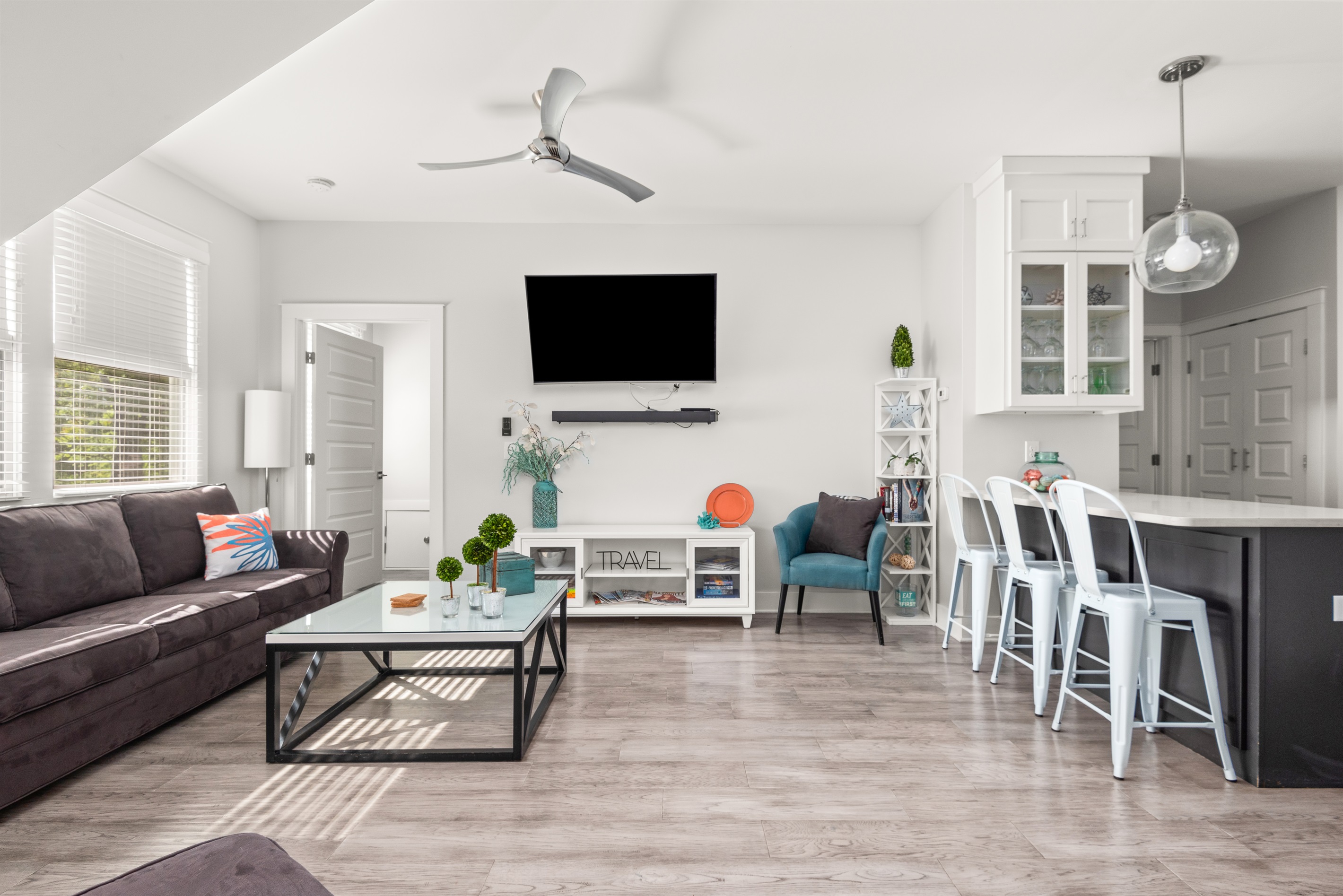 Cozy and bright, with plenty of seating. There's also YouTubeTV and streaming access.