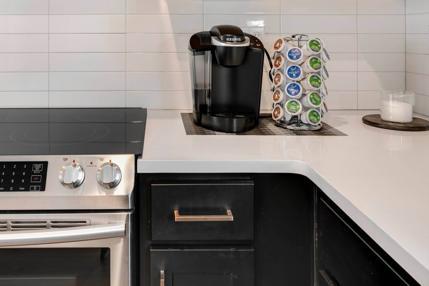 There's a Keurig and a supply of coffee K-cups, sugar, and vanilla creamer because... priorities.