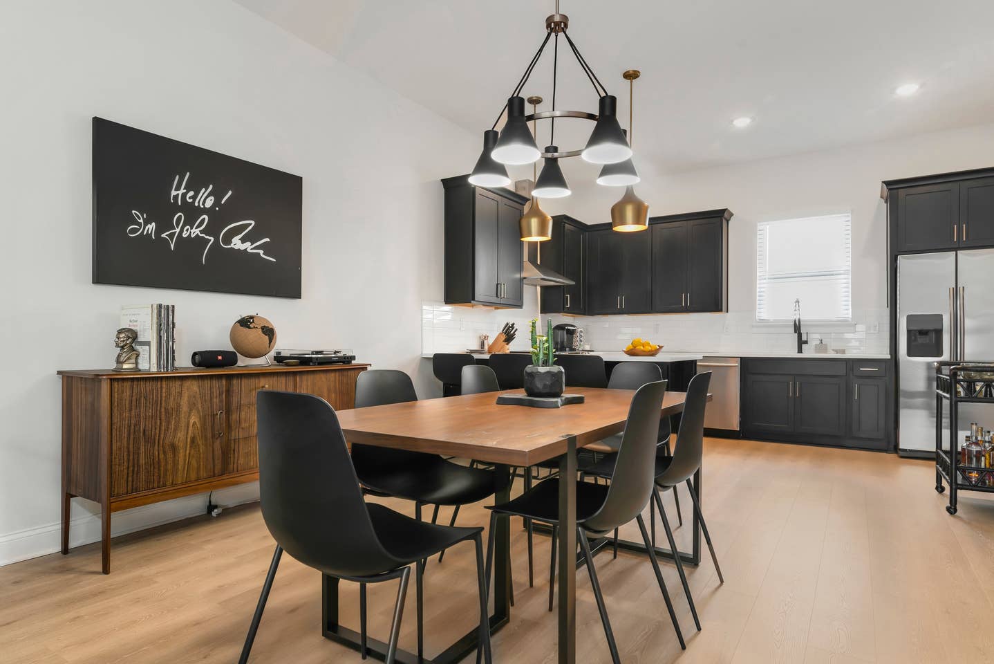 Plenty of seating at the dining table and kitchen bar