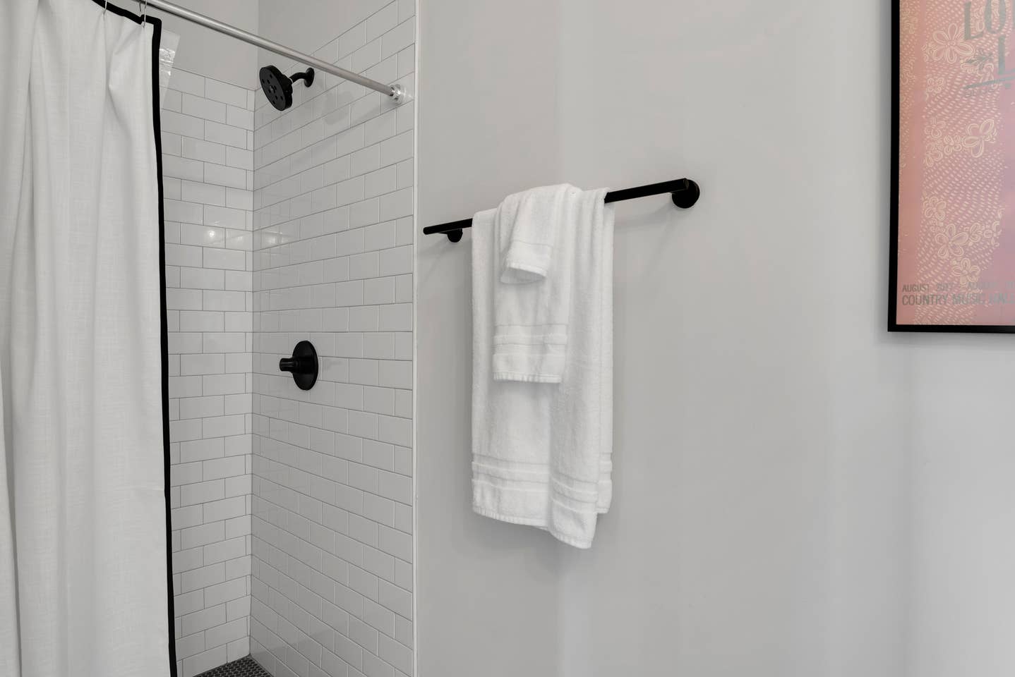 Stall shower with white subway tiles has a classic look