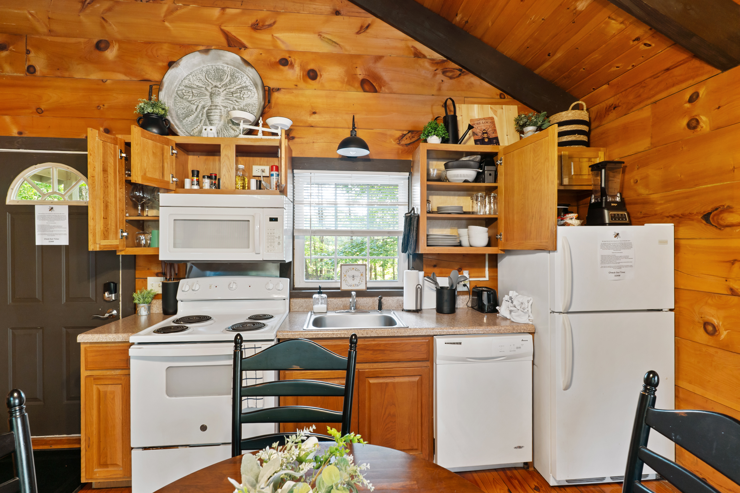 Cook or unwind with ease in the fully stocked kitchen. From morning coffee to a cozy dinner in, everything you need is right here — even the blender!