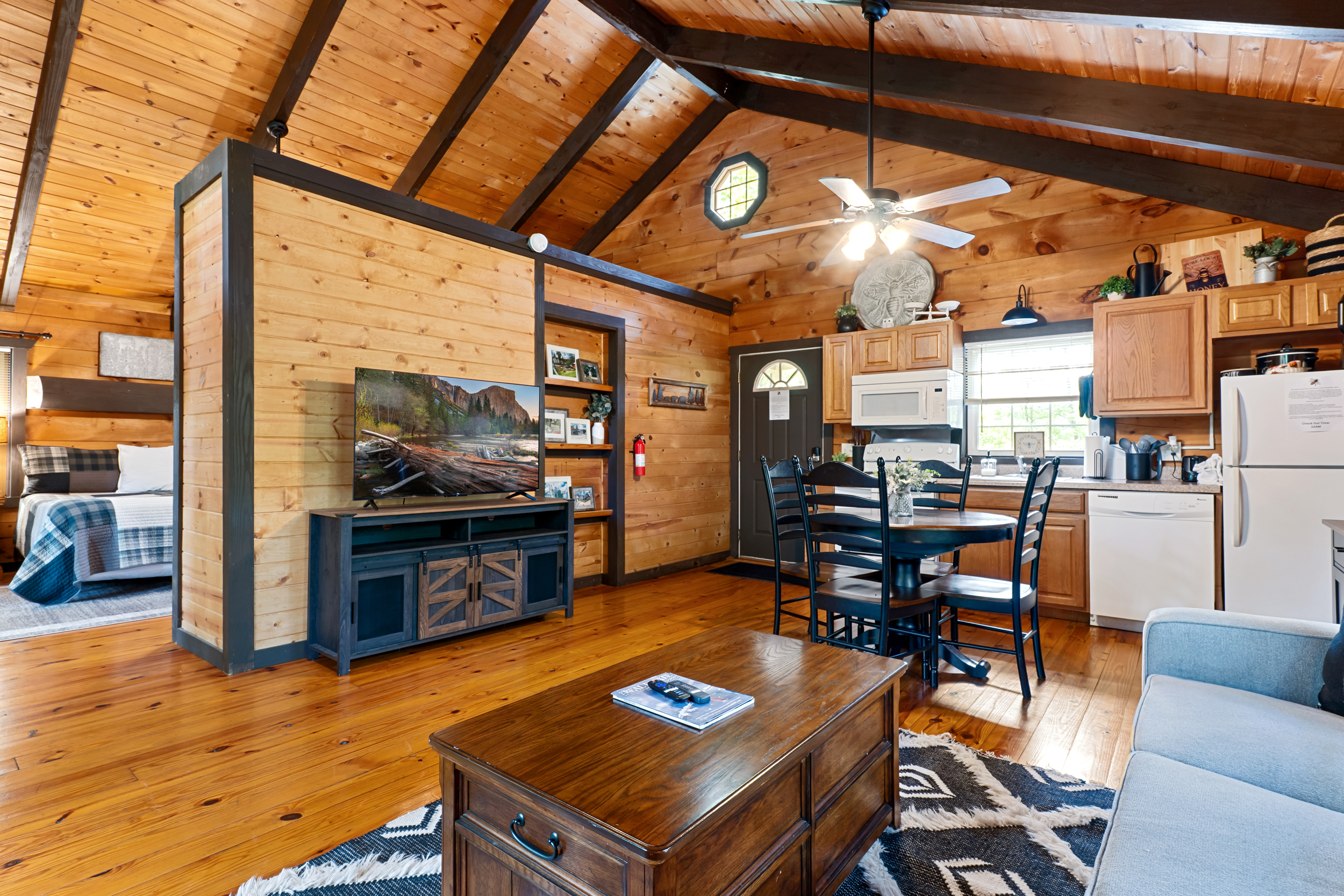 Relax beneath vaulted ceilings in the warm, wood-toned living space. Curl up with a book or stream your favorite show after a day of hiking or exploring town.