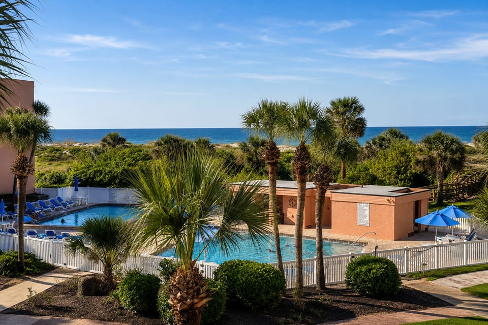 Private balcony with ocean views overlooking the pools and direct boardwalk access to beautiful St. Augustine Beach.