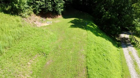 Site 4 nestled in the mountains with pasture views.