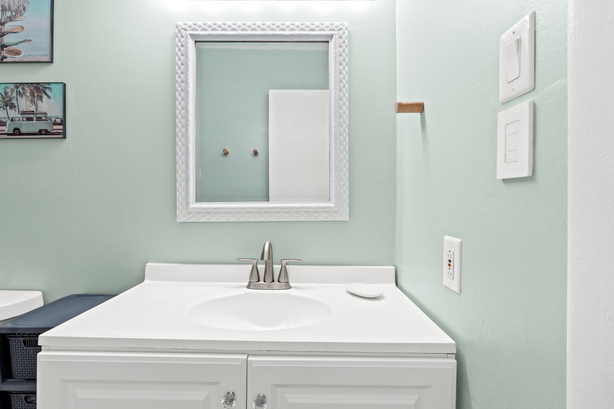 Simple, well-lit vanity space perfect for getting ready with ease.