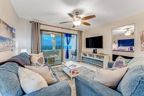 Living Room with 50" Smart TV with cable, internet and fireplace. Queen sized sleeper sofa with easy to move coffee table on casters.