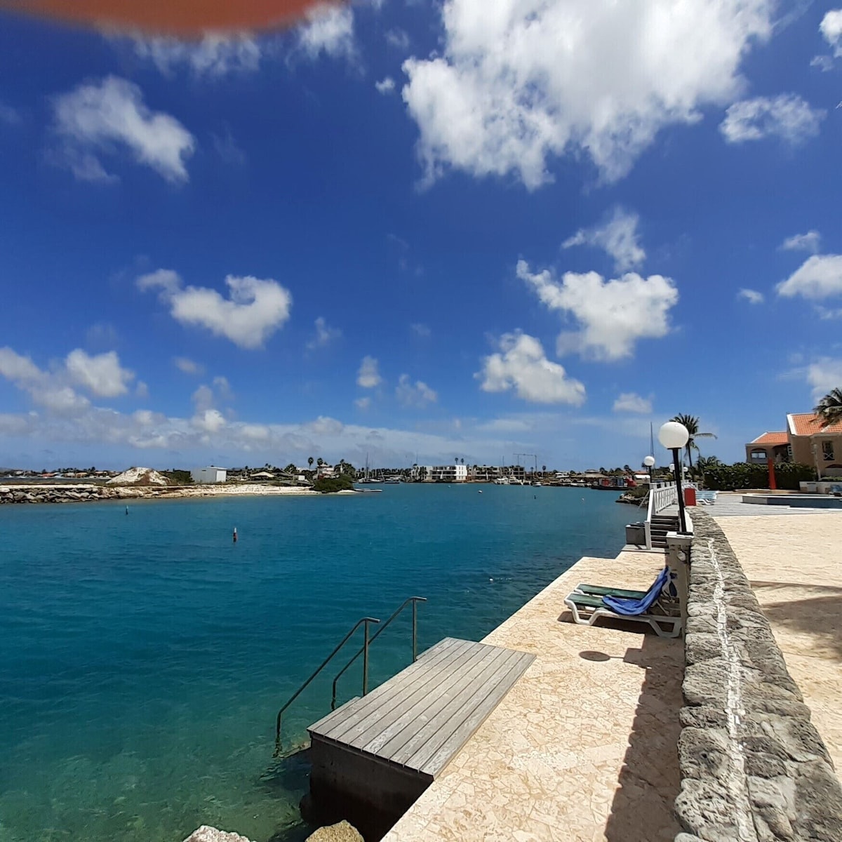 This is shore diving. Ladder entry so no sand and no rocks/coral. 