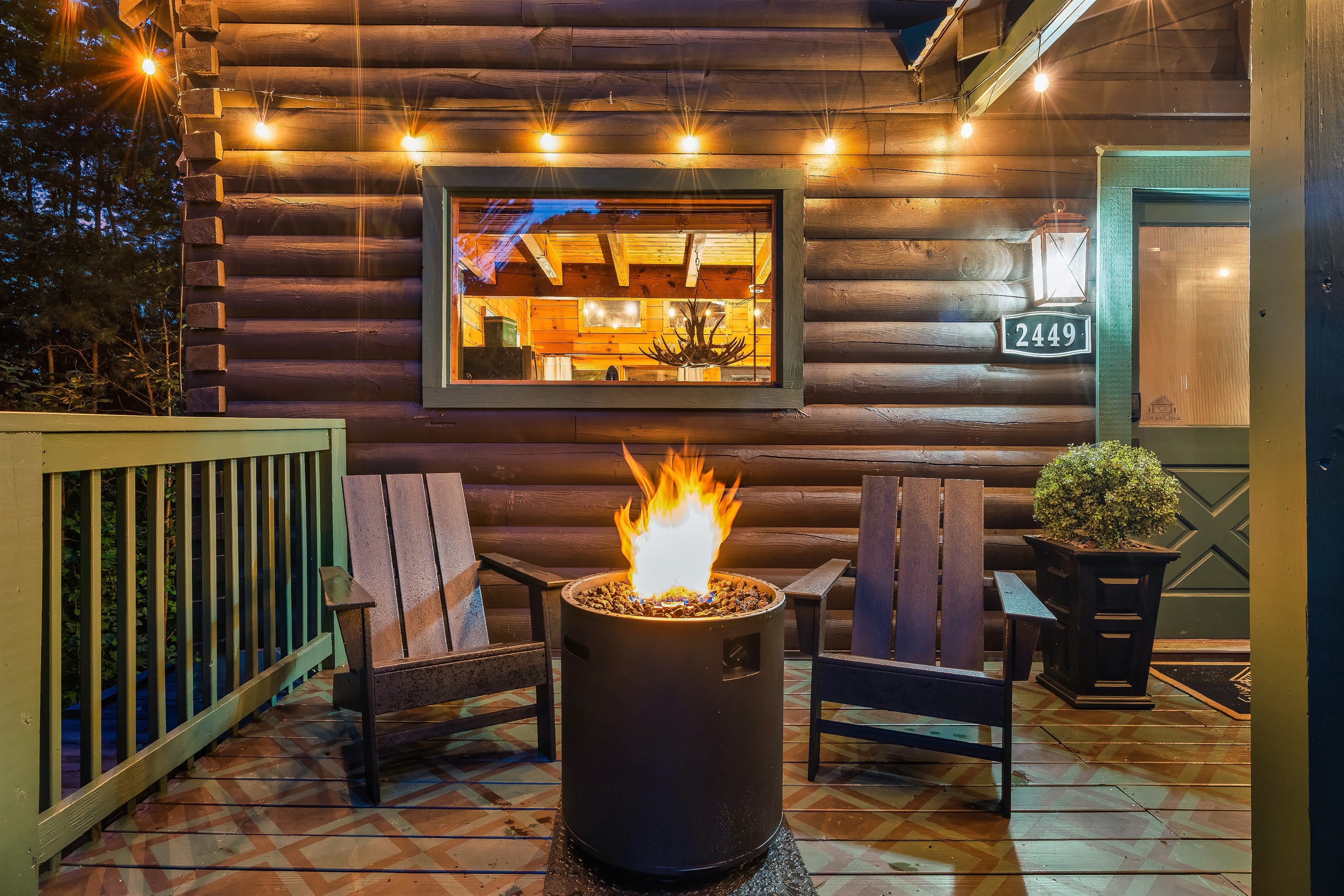 Get cozy on the private cabin porch with two Adirondack chairs and a modern gas fire pit, perfect for romantic evenings or relaxing with a drink.