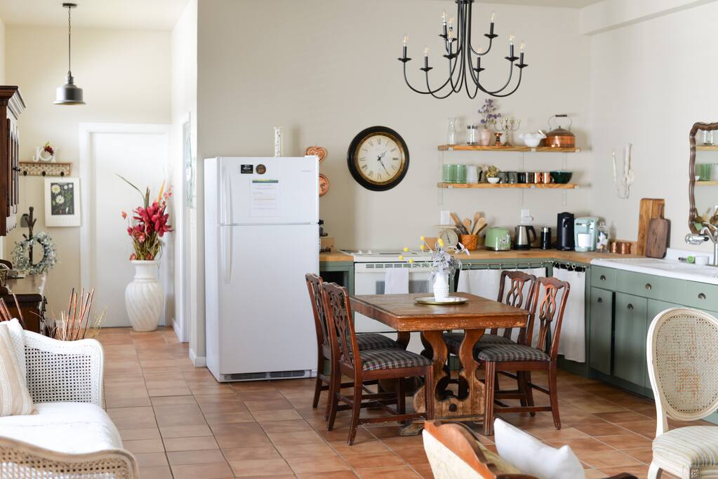 This delightful property features a cutie dining area, where you can enjoy meals with your loved ones at the inviting four-seat table. The kitchen is fully equipped with essential utensils and Refrigirator