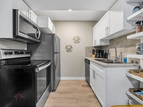 Enjoy the ease of cooking in this well-equipped kitchen.