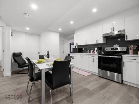 Easily prepare meals using the stovetop oven, microwave, and refrigerator available in the kitchen.