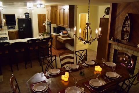 Dinig Room with fire place Breakfast
Bar and Kitchen
b