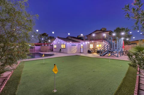 Shaded Pebble tec pool, patio, BBQ, Putting green, pool basketball, and games