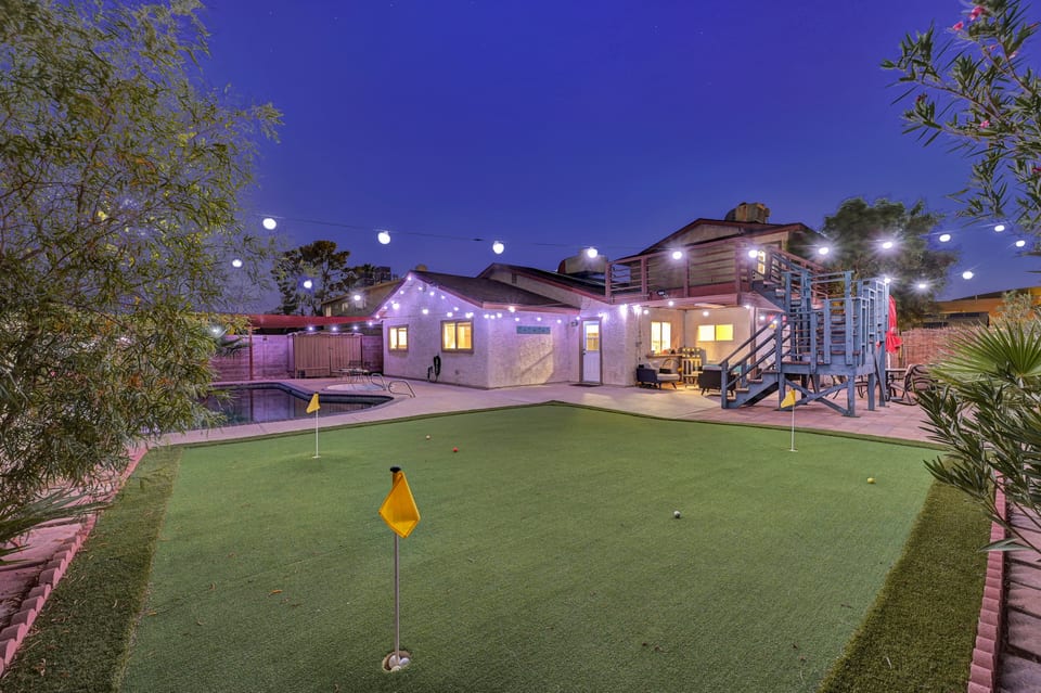Shaded Pebble tec pool, patio, BBQ, Putting green, pool basketball, and games