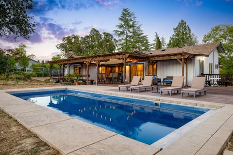 Your private sanctuary: Enjoy seamless indoor-outdoor flow from our oversized deck to the sparkling pool.