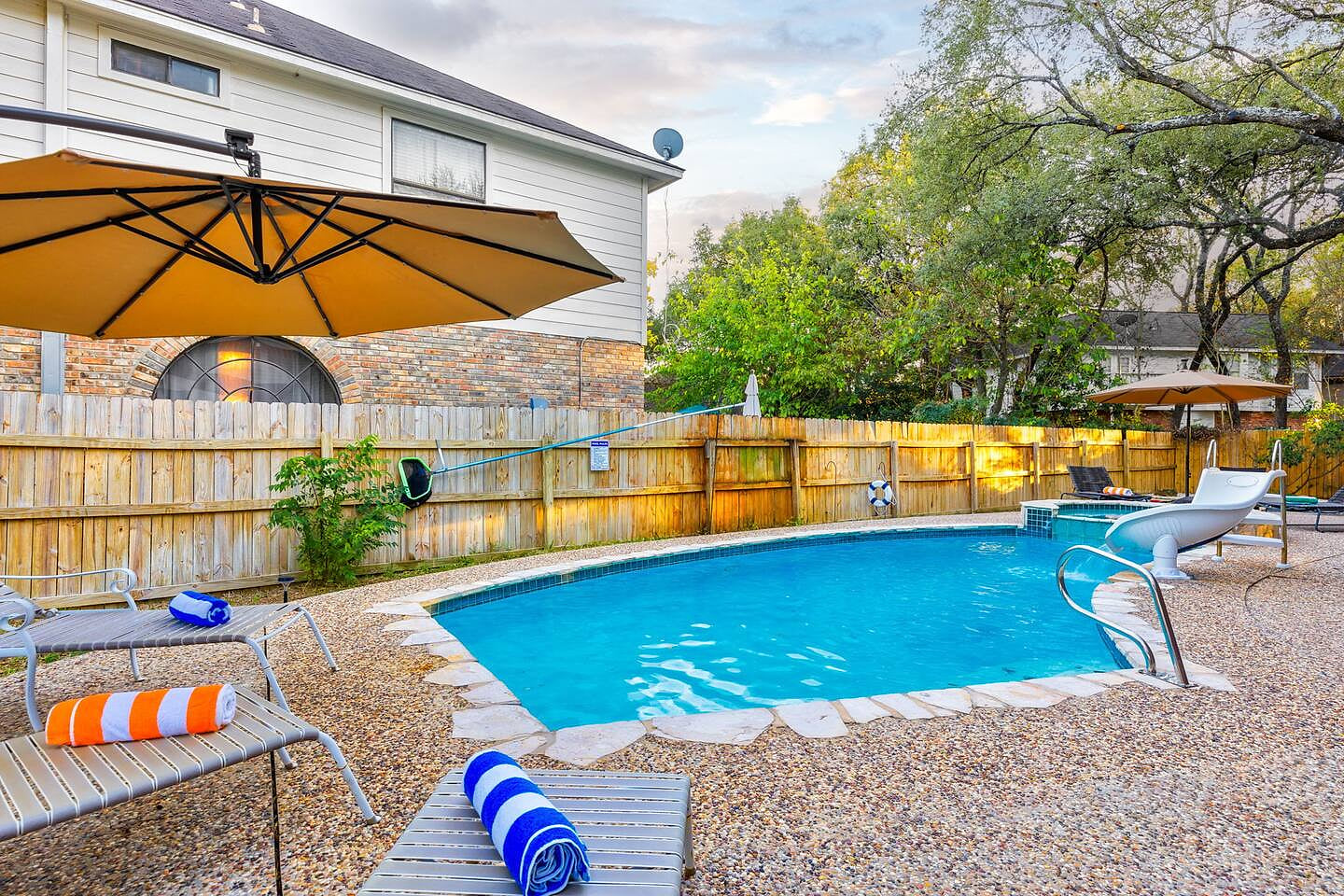 Kid-friendly vacation home in San Antonio, where you'll enjoy a refreshing dip in our sparkling Grecian lazy swimming pool, complete with a kids water slide and deep octagon spa. Our 5-bedroom vacation home is the perfect place to relax and unwind.